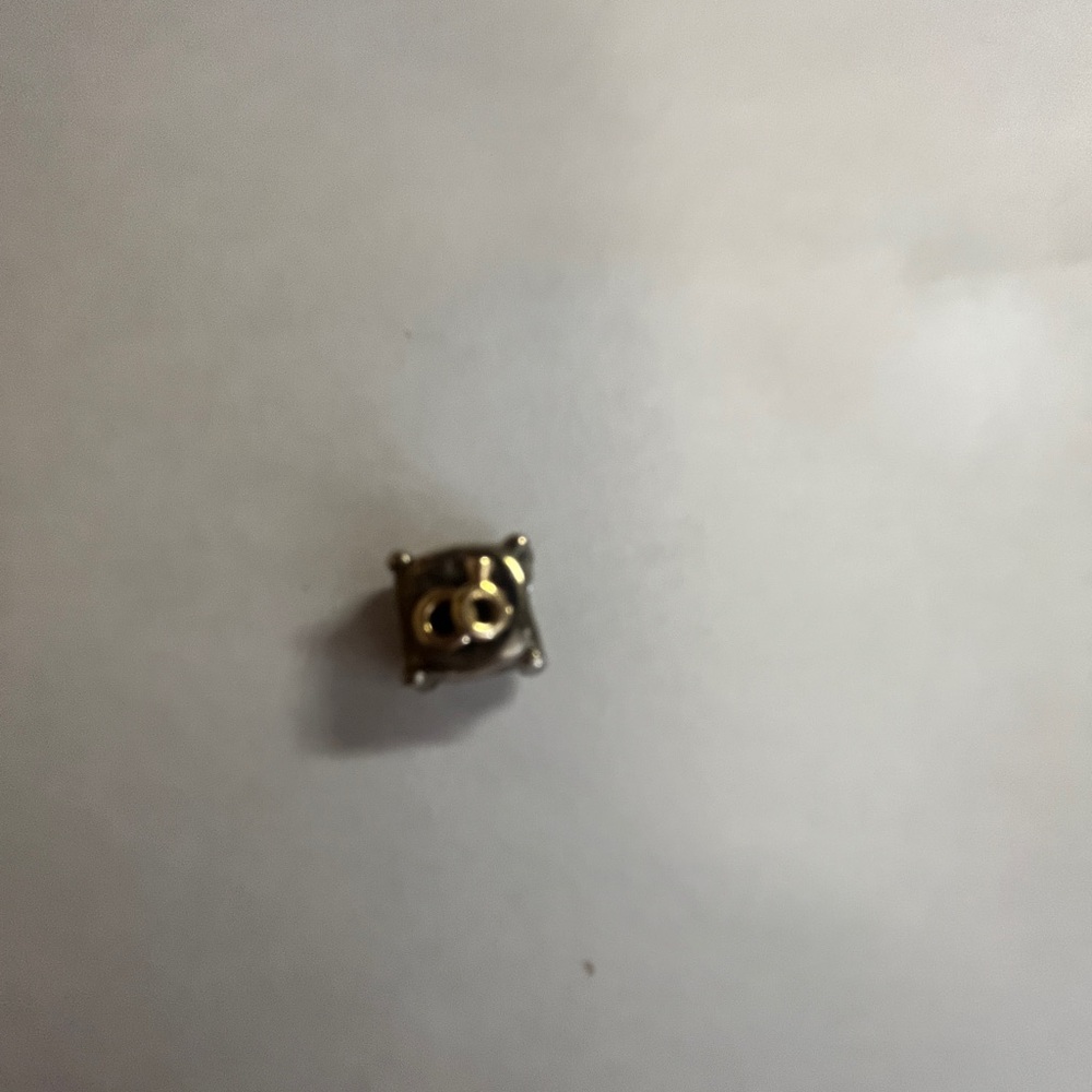 Pandora wedding rings on a pillow charm
